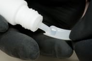 How to get nail glue off skin (Image via Getty Image/ Hightower_NRW)